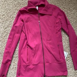 New with tags unattached Lululemon in stride Jacket sz 10